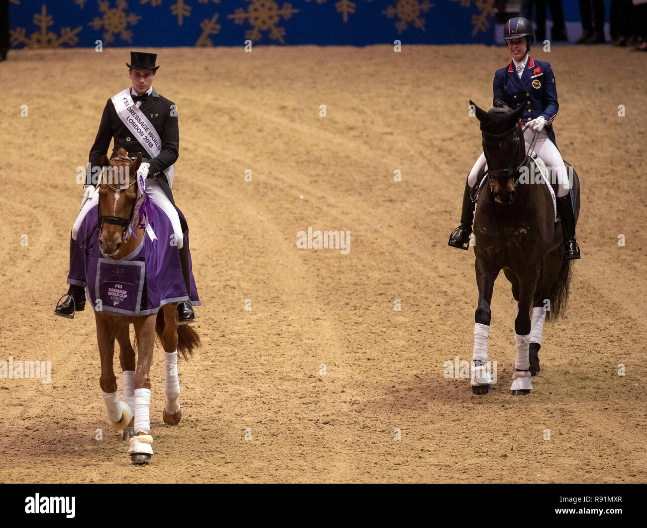 La Germania Federic Wanders (sinistra) riding duca di Bretagna vince il dressage FEI World Cup Grand Prix Freestyle da Gran Bretagna Charlotte Dujardin (a destra) durante il giorno due del London International Horse Show a Olympia di Londra. Foto Stock