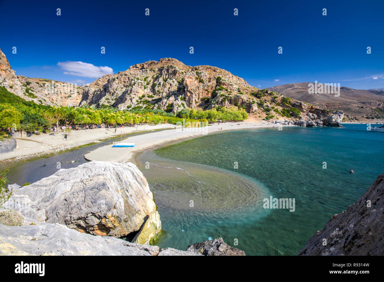 Preveli beach sull'isola di Creta con azure acqua chiara, la Grecia, l'Europa. Creta è la più grande e la più popolata delle isole greche. Foto Stock