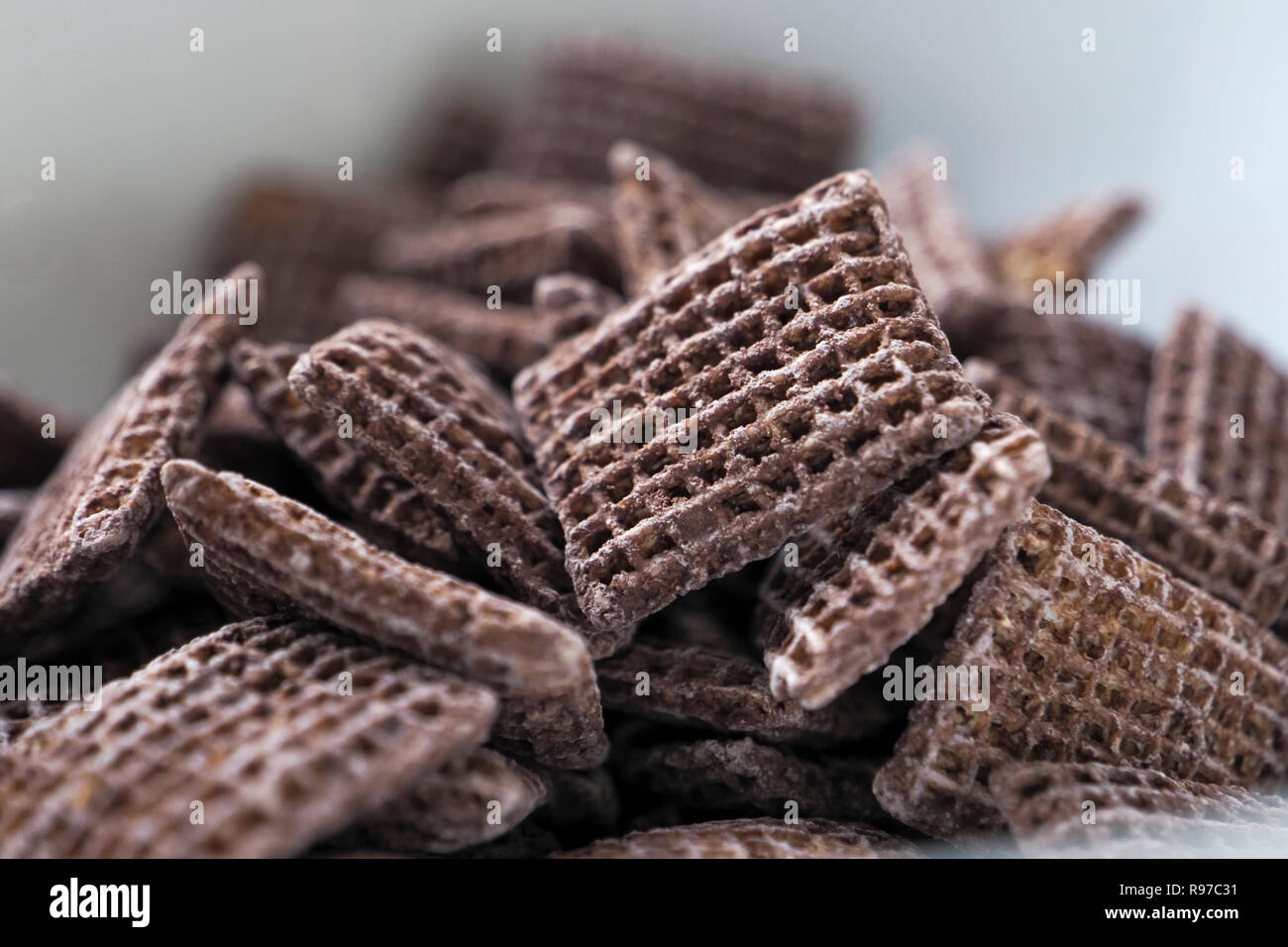 Molto vicino di Coco Shreddies in una ciotola Foto Stock