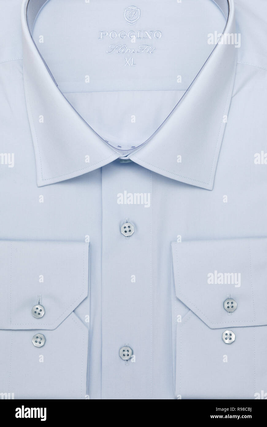 Uomini camicia di imballaggio close-up macro vista dall'alto. Foto Stock