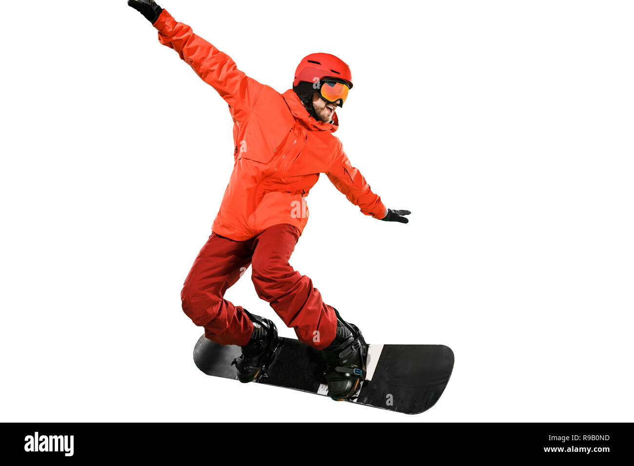 Ritratto di giovane uomo in abbigliamento sportivo con lo snowboard isolato  su un bianco di sfondo per studio. L'inverno, sport, lo snowboard, lo  snowboarder, attività estrema Foto stock - Alamy