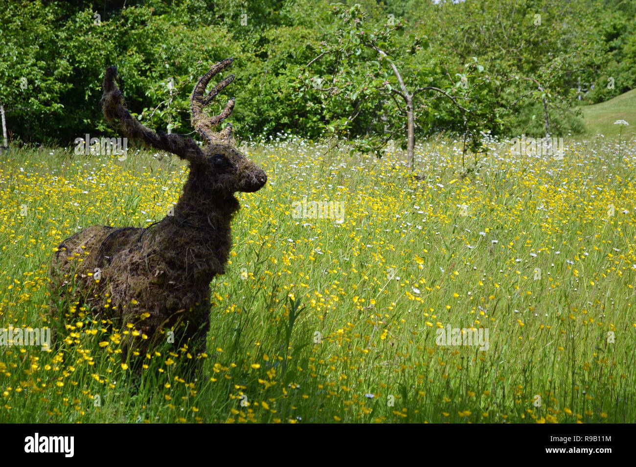 Deer scultura a Exbury Gardens, Hampshire, Regno Unito Foto Stock