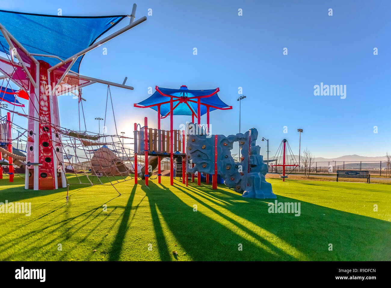 Luce solare drammatico sul parco giochi in Utah Valley Foto Stock
