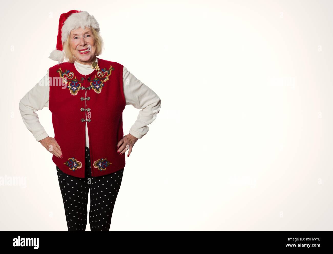 Donna senior di celebrare il Natale Foto Stock