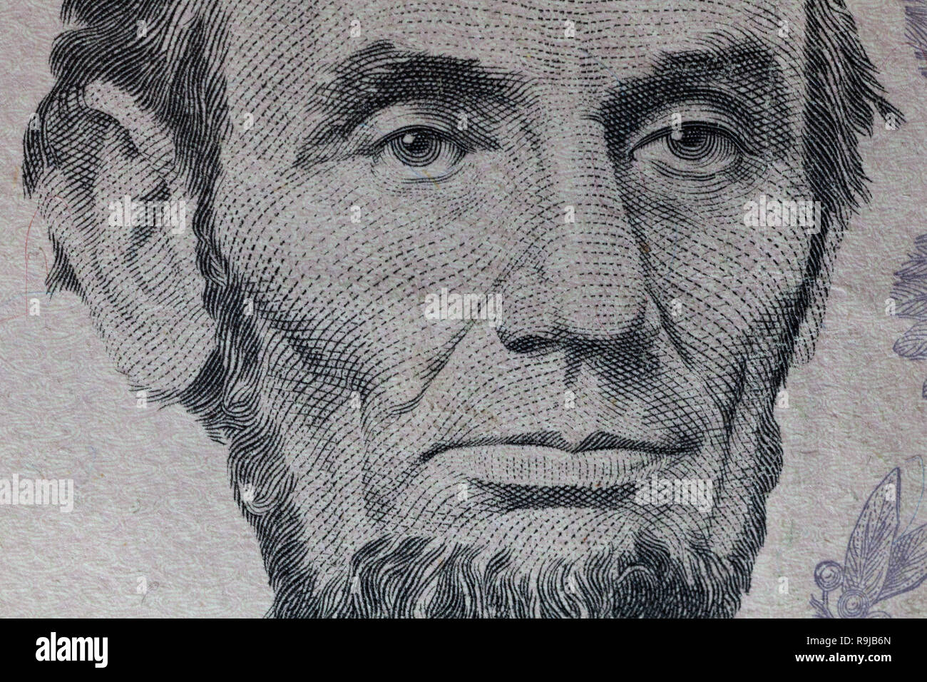 Abraham Lincoln ritratto macro usa cinque dollar banconota o bill. Foto Stock