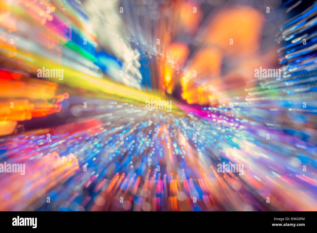 Luce astratta esplosione effetto sfondo. Una lunga esposizione fotografia di movimento spie luminose Foto Stock