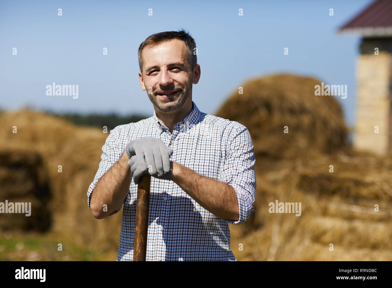 Contadino al lavoro Foto Stock