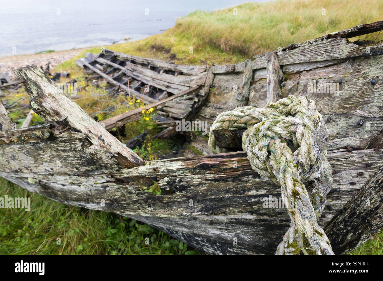 Vecchia barca a remi su Fetlar molo vecchio, isole Shetland, Regno Unito Foto Stock