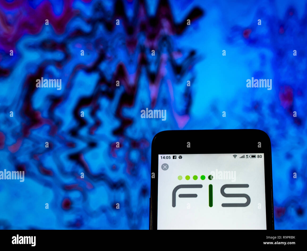 Di Fidelity National Information Services Inc. logo che si vede visualizzato sul telefono intelligente Foto Stock