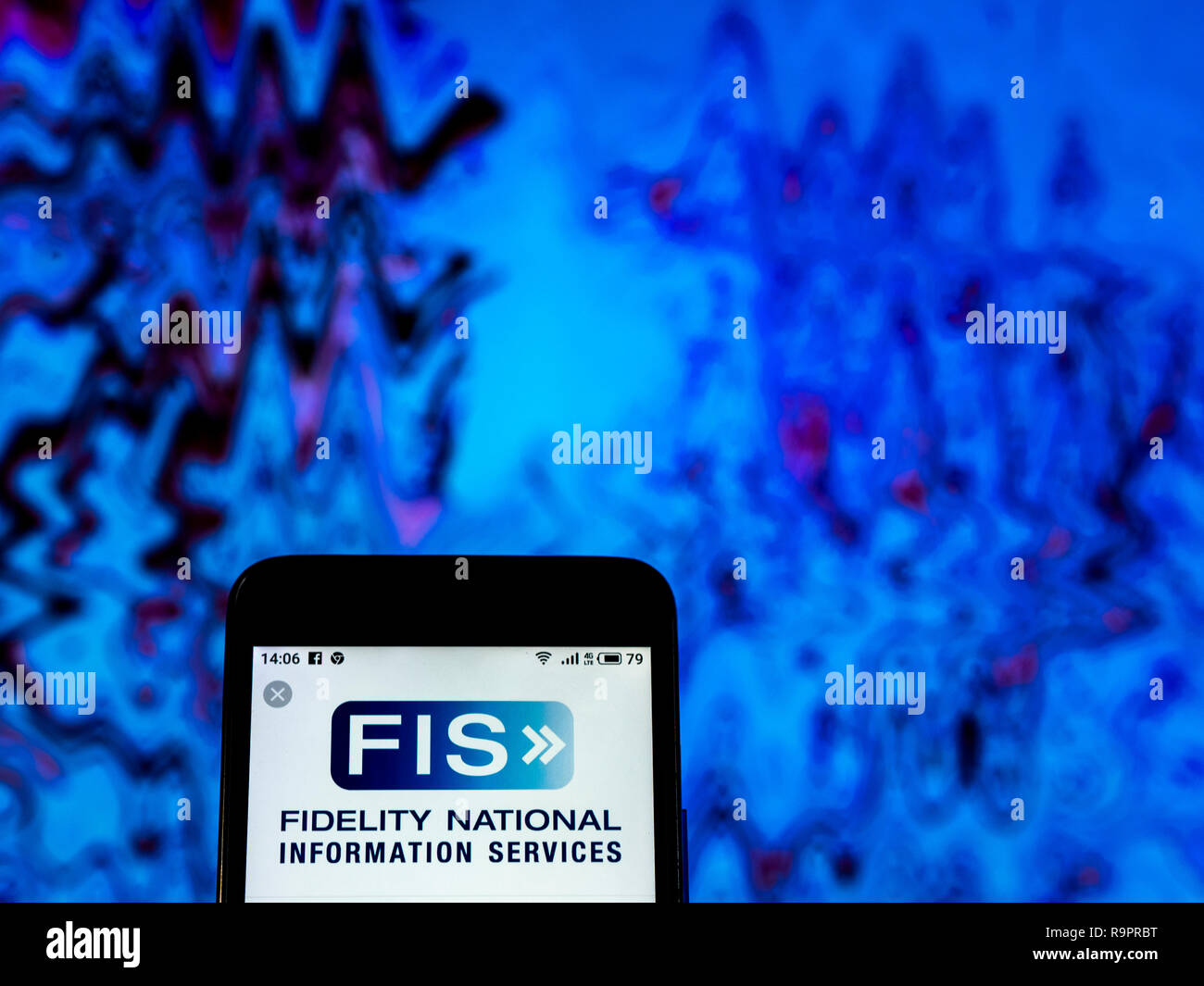 Di Fidelity National Information Services Inc. logo che si vede visualizzato sul telefono intelligente Foto Stock