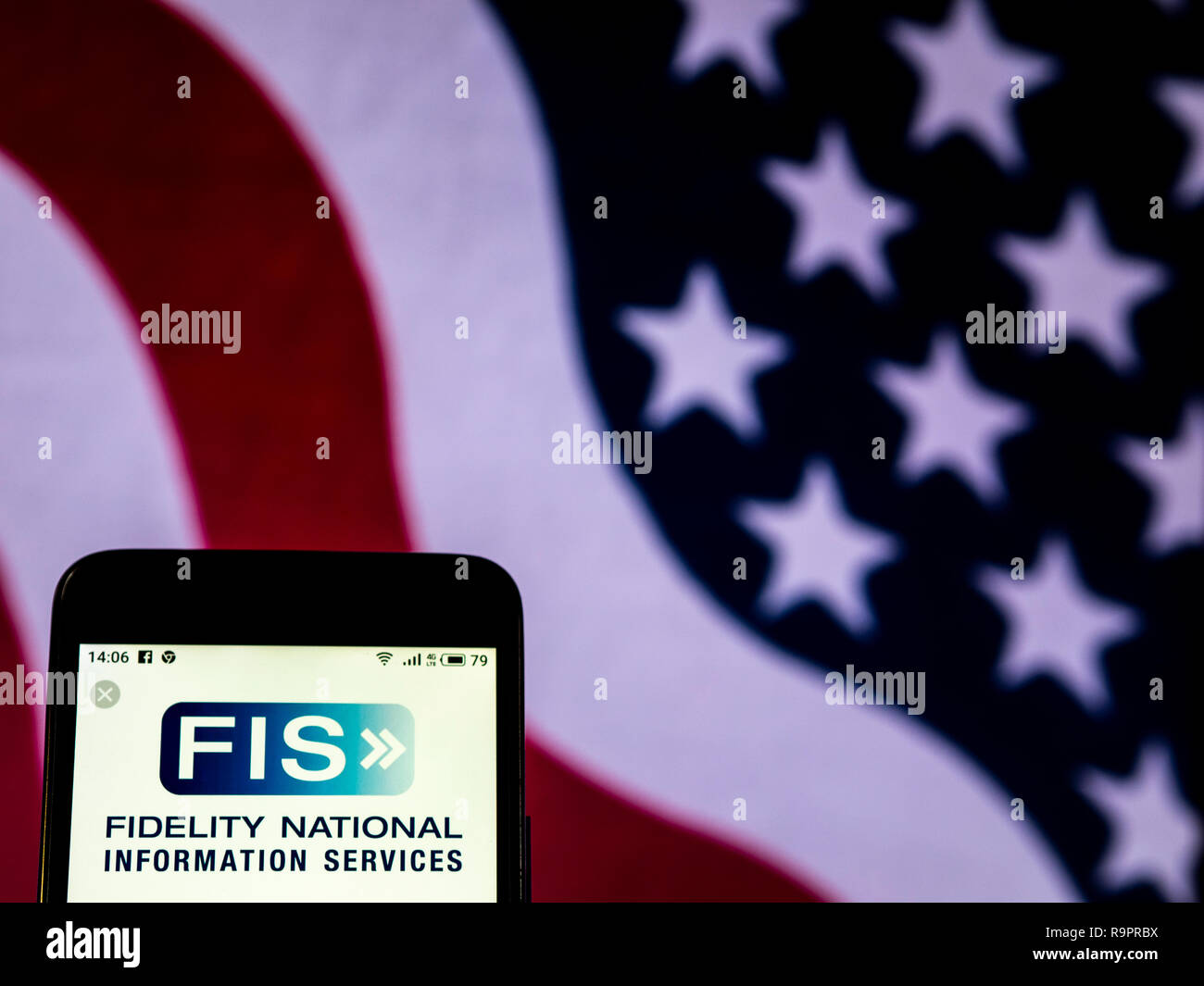Di Fidelity National Information Services Inc. logo che si vede visualizzato sul telefono intelligente Foto Stock