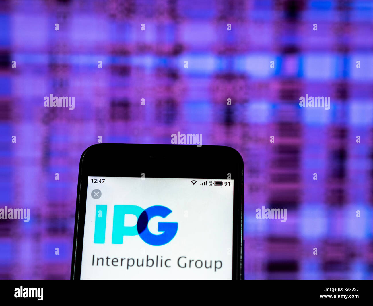 Interpublic gruppo di società società di pubblicità visto il logo visualizzato sul telefono intelligente Foto Stock
