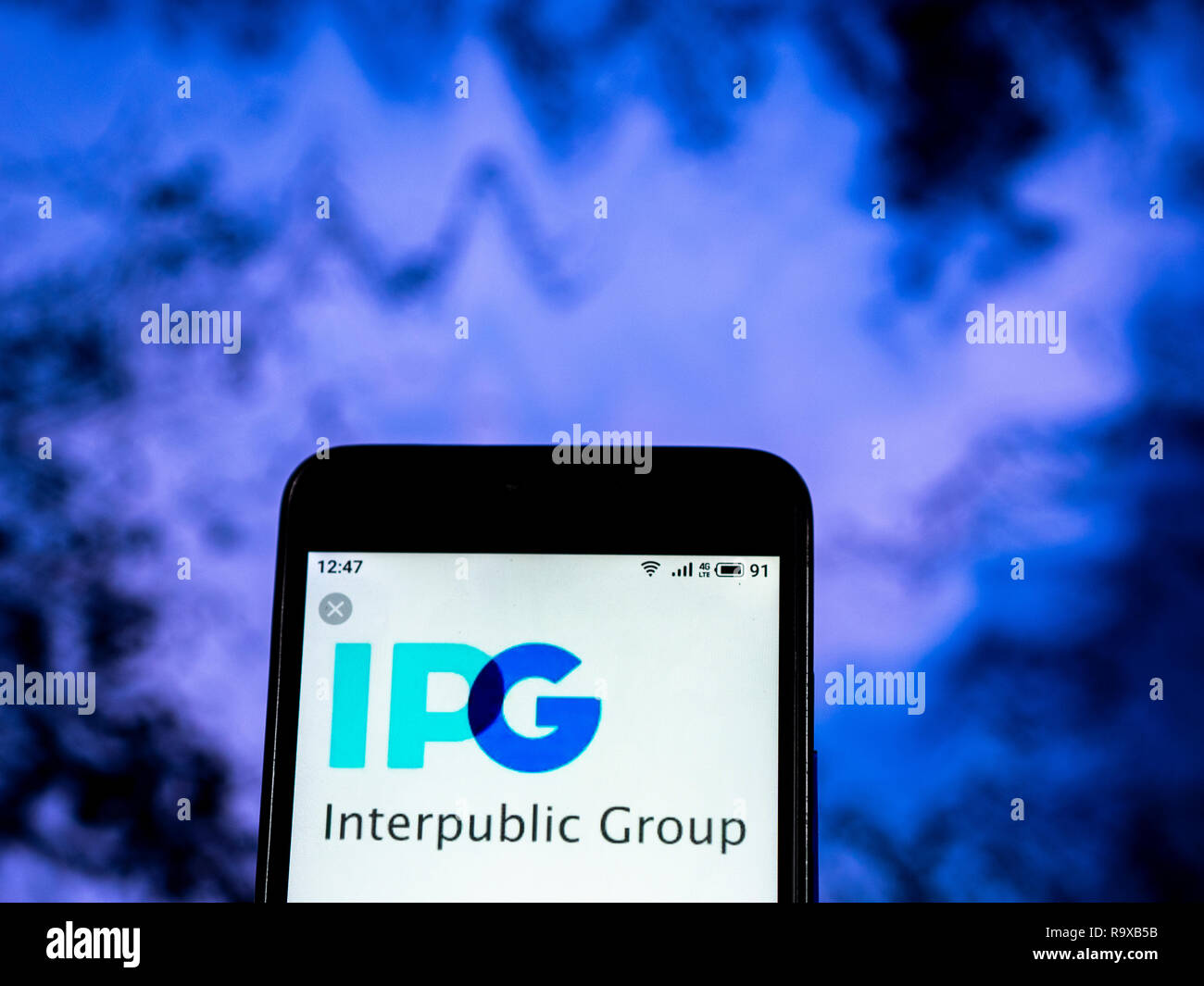 Interpublic gruppo di società società di pubblicità visto il logo visualizzato sul telefono intelligente Foto Stock