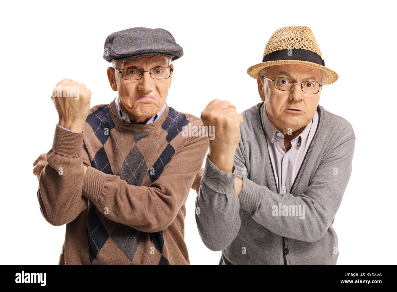 Due arrabbiato alti uomini gesti con le mani isolati su sfondo bianco Foto Stock