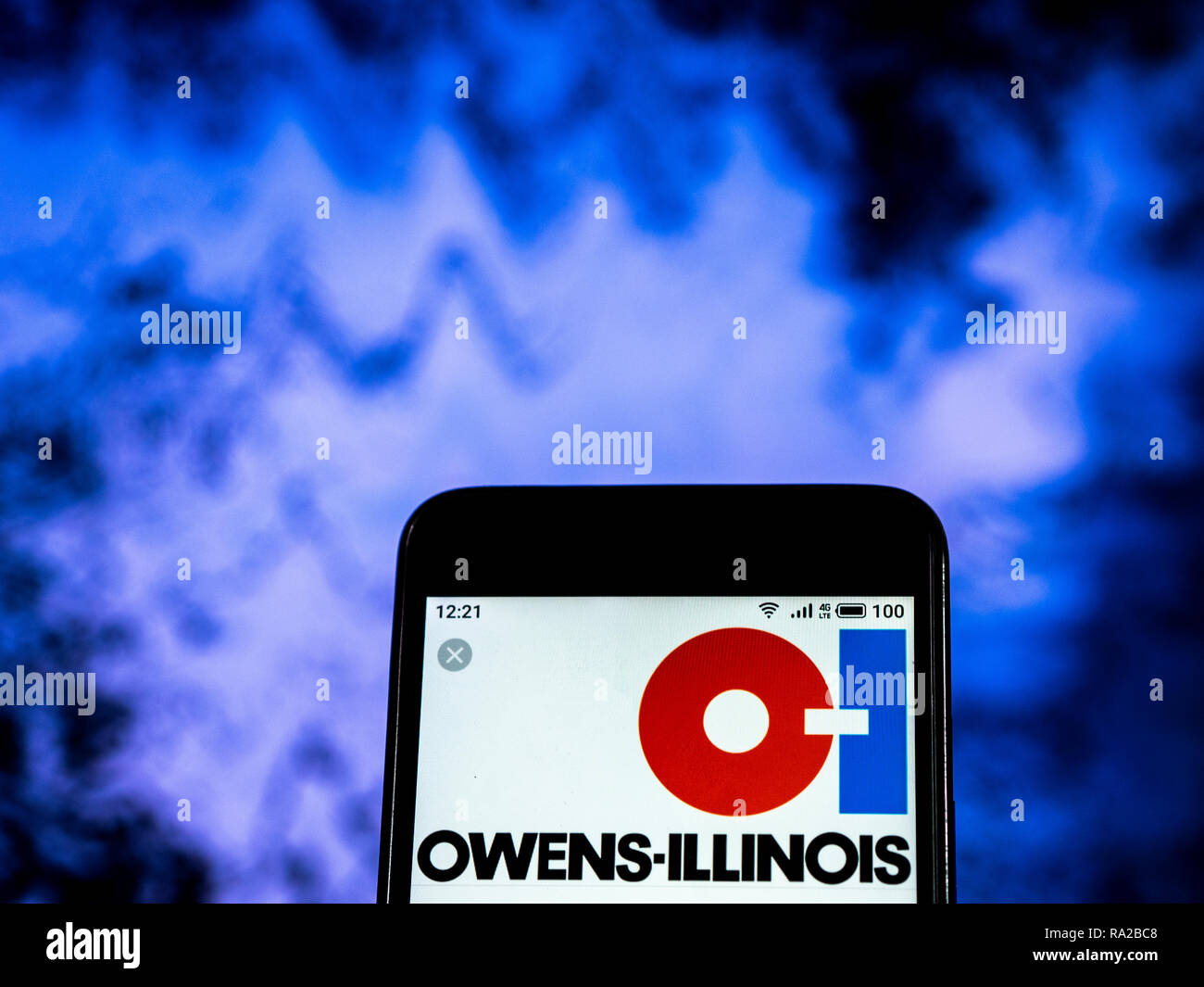 Owens-Illinois Glass Company logo che si vede visualizzato sul telefono intelligente Foto Stock