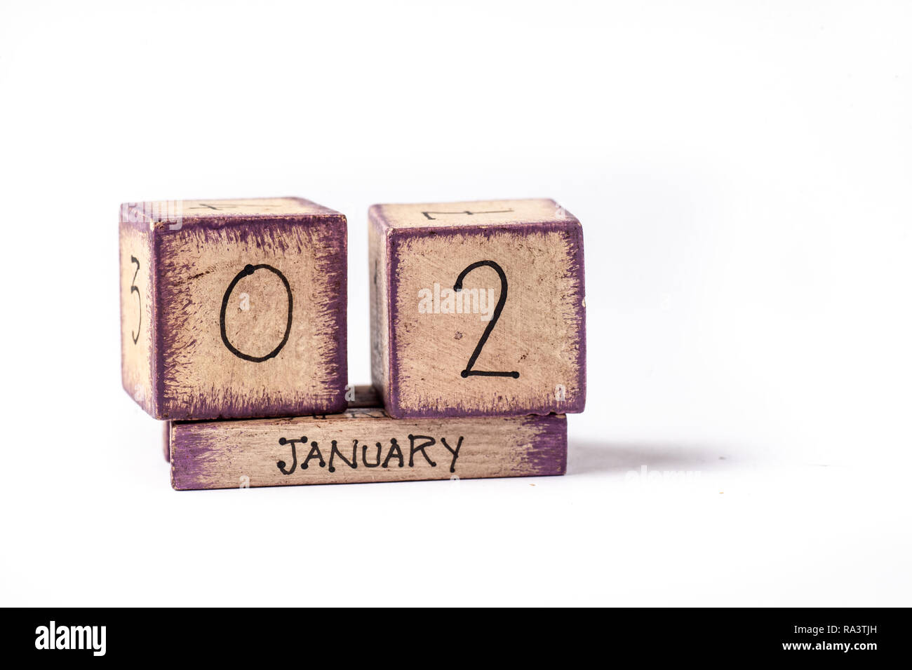 In legno colorato blocco calendario perpetuo che mostra 2 Gennaio Foto Stock