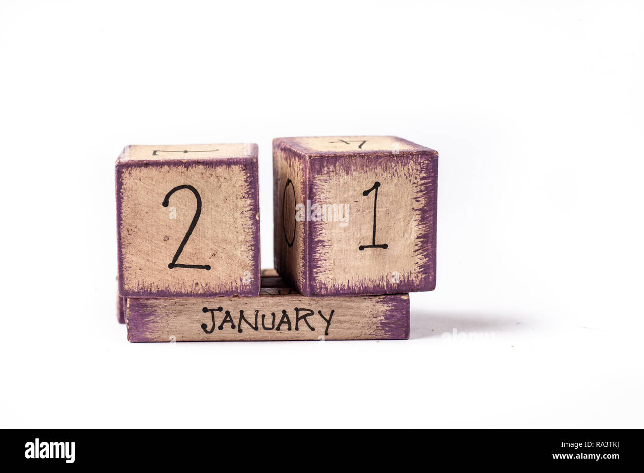 In legno colorato blocco calendario perpetuo che mostra 21 Gennaio Foto Stock