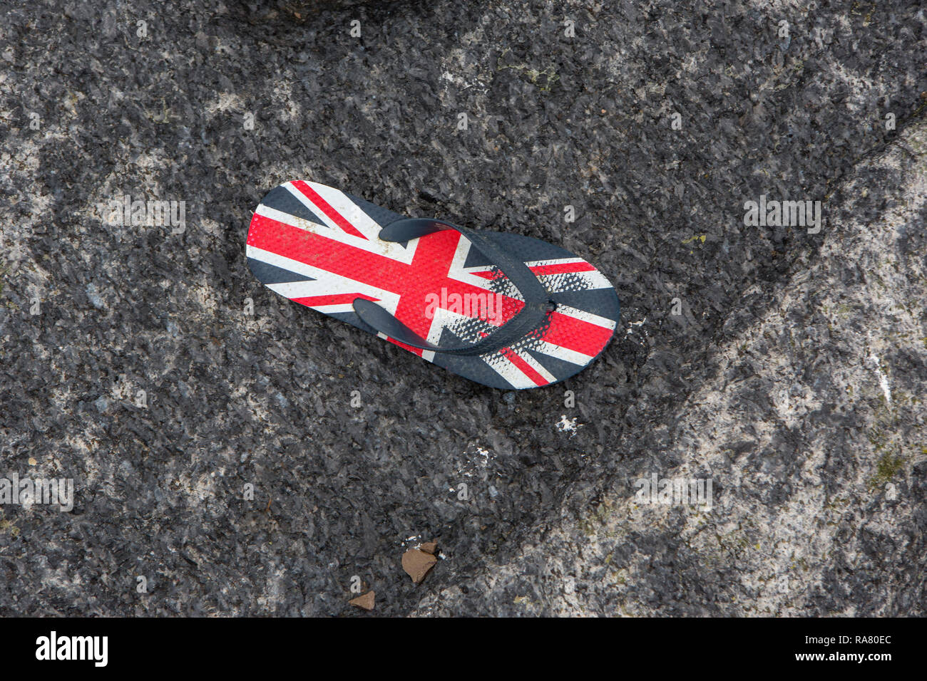 Un usurato Unione Jack flip flop Foto Stock