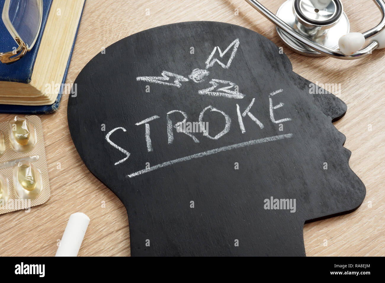Corsa di malattia scritto su una testa di forma. Foto Stock