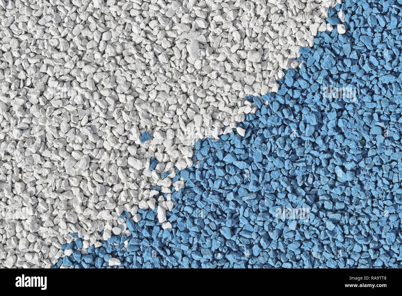 Bianco e blu con ghiaia decorativa texture di pietra Foto Stock