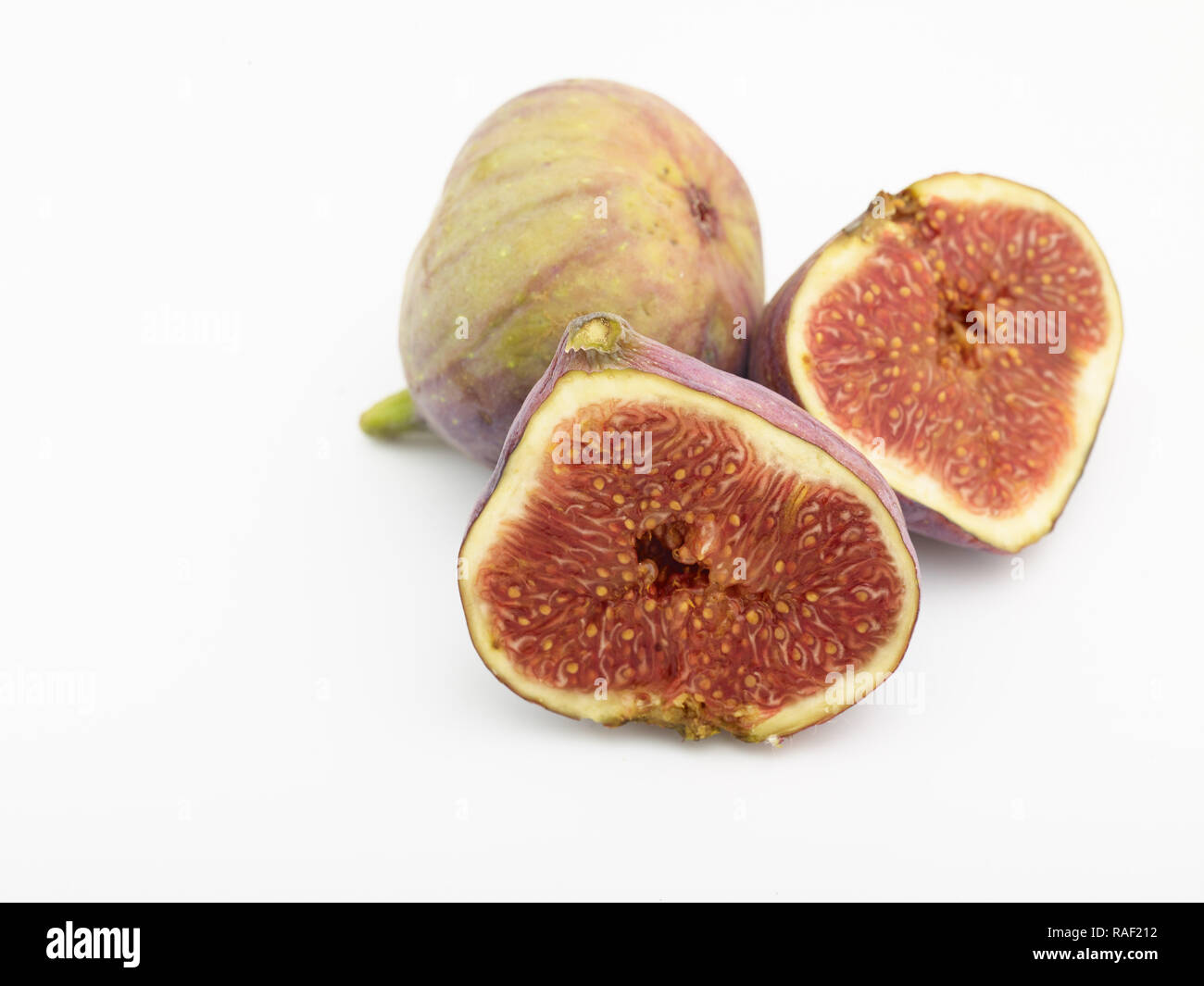 Figg contro uno sfondo bianco, cibo ritratto Foto Stock