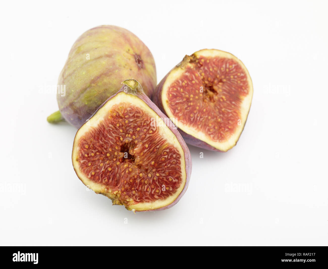 Figg contro uno sfondo bianco, cibo ritratto Foto Stock