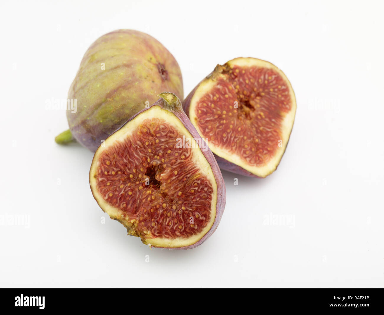 Figg contro uno sfondo bianco, cibo ritratto Foto Stock