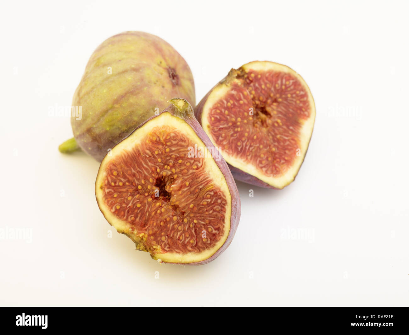 Figg contro uno sfondo bianco, cibo ritratto Foto Stock