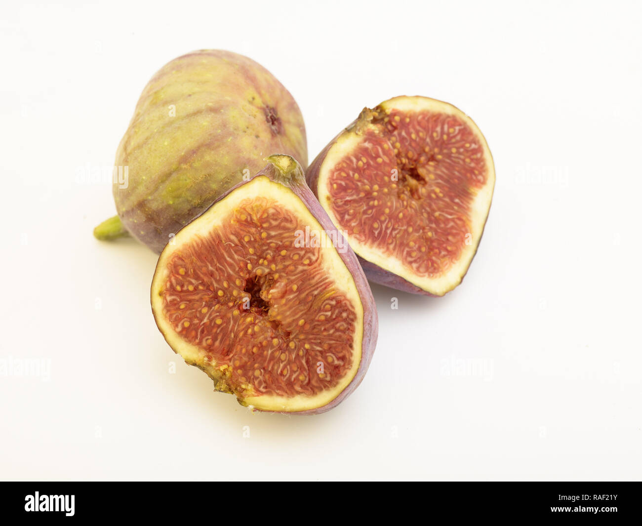 Figg contro uno sfondo bianco, cibo ritratto Foto Stock