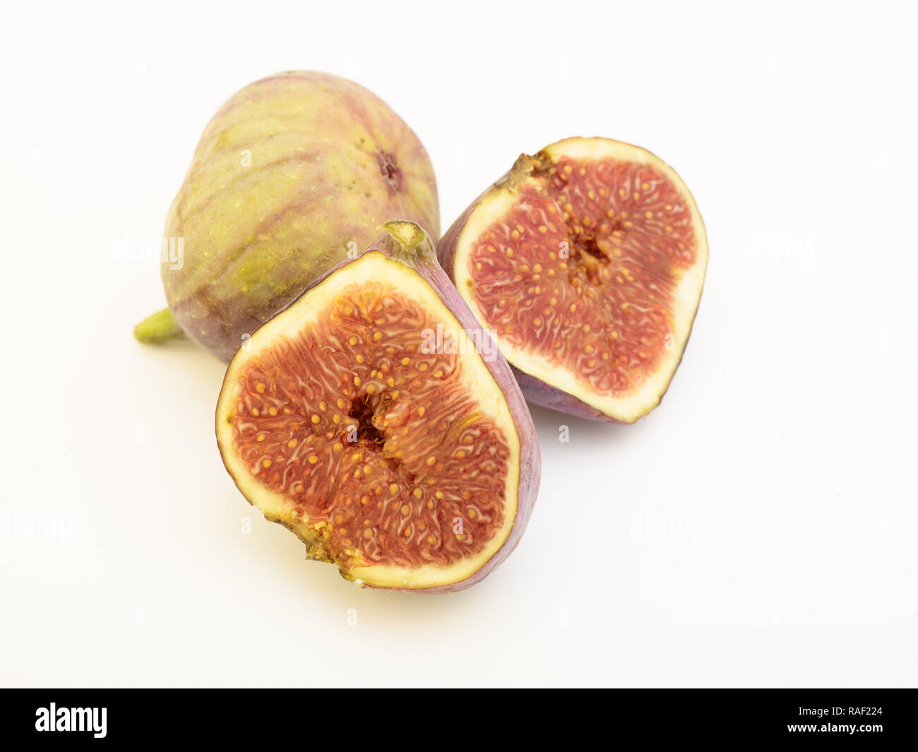Figg contro uno sfondo bianco, cibo ritratto Foto Stock