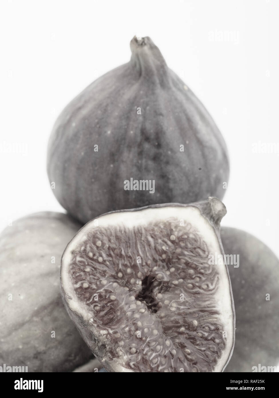 Fig frutto contro uno sfondo bianco, cibo still-life fotografia Foto Stock