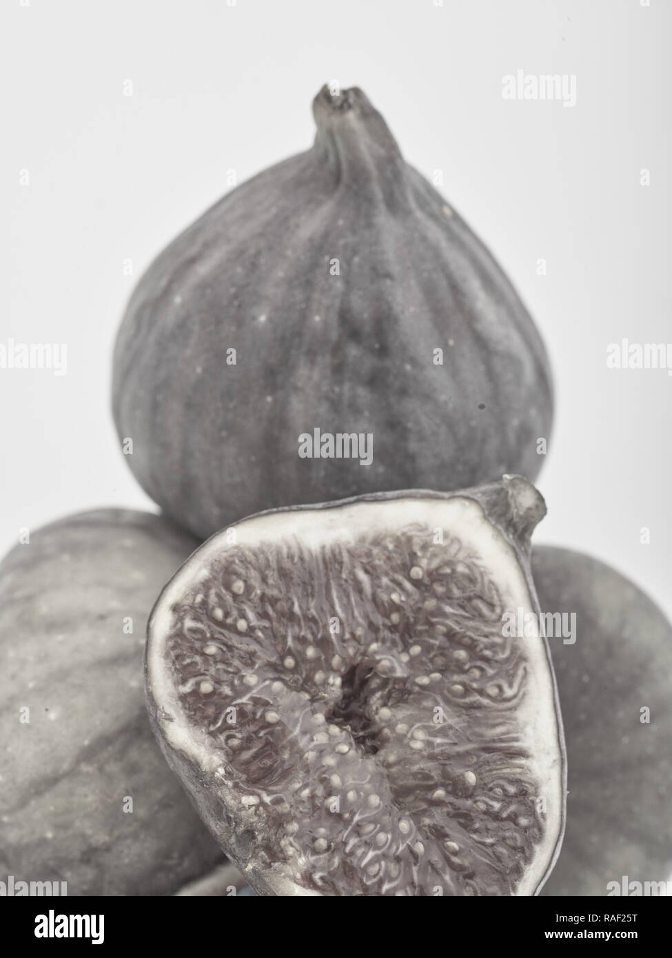Fig frutto contro uno sfondo bianco, cibo still-life fotografia Foto Stock