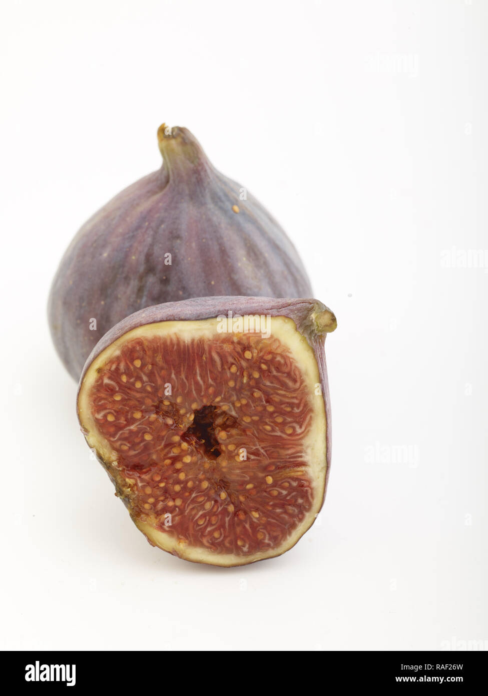 Fig frutto contro uno sfondo bianco, cibo still-life fotografia Foto Stock