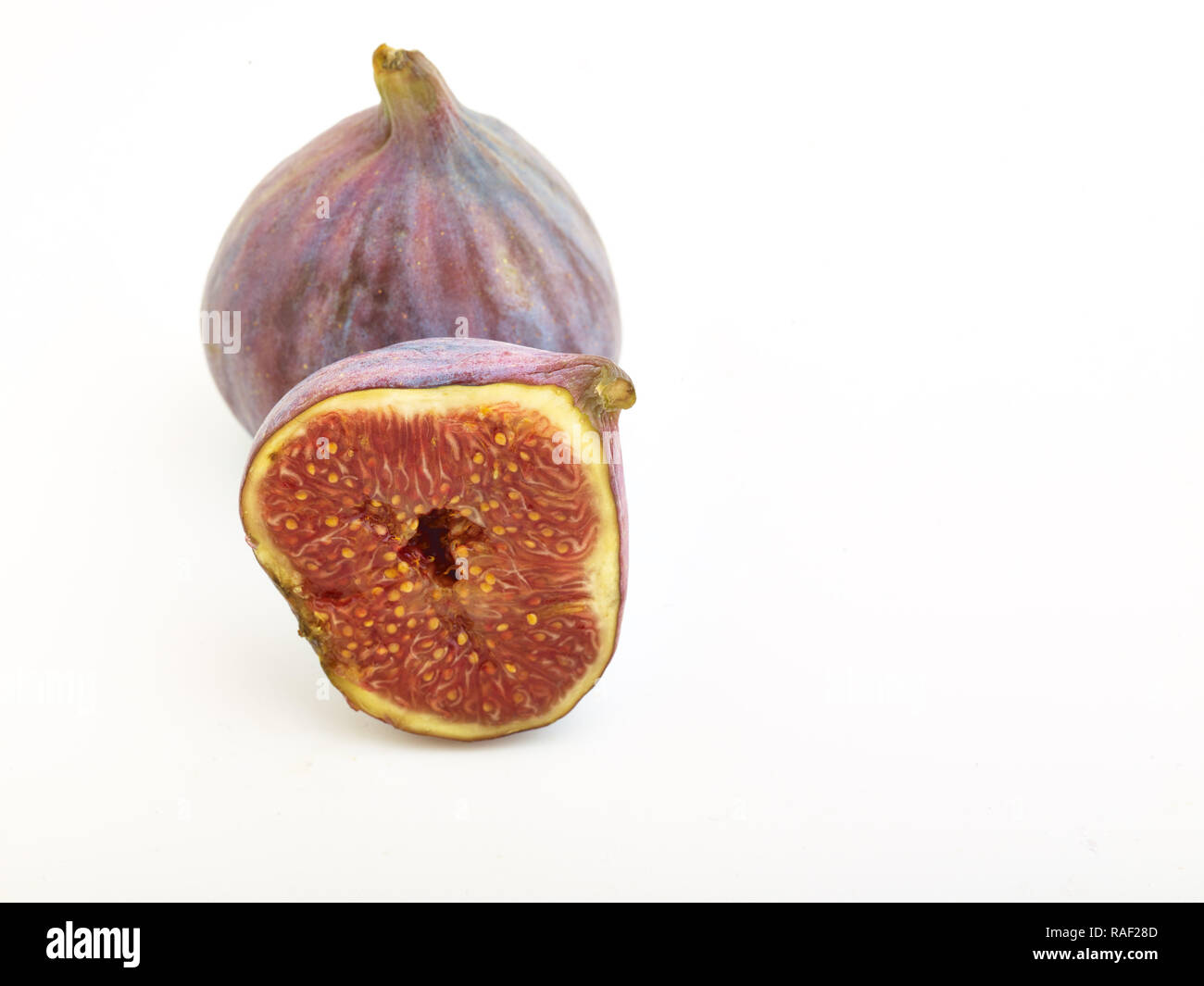 Fig frutto contro uno sfondo bianco, cibo still-life fotografia Foto Stock