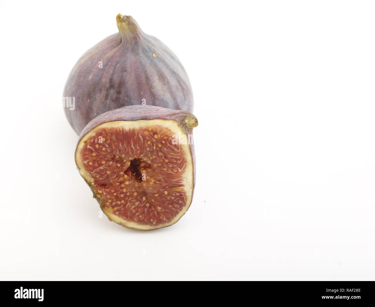 Fig frutto contro uno sfondo bianco, cibo still-life fotografia Foto Stock