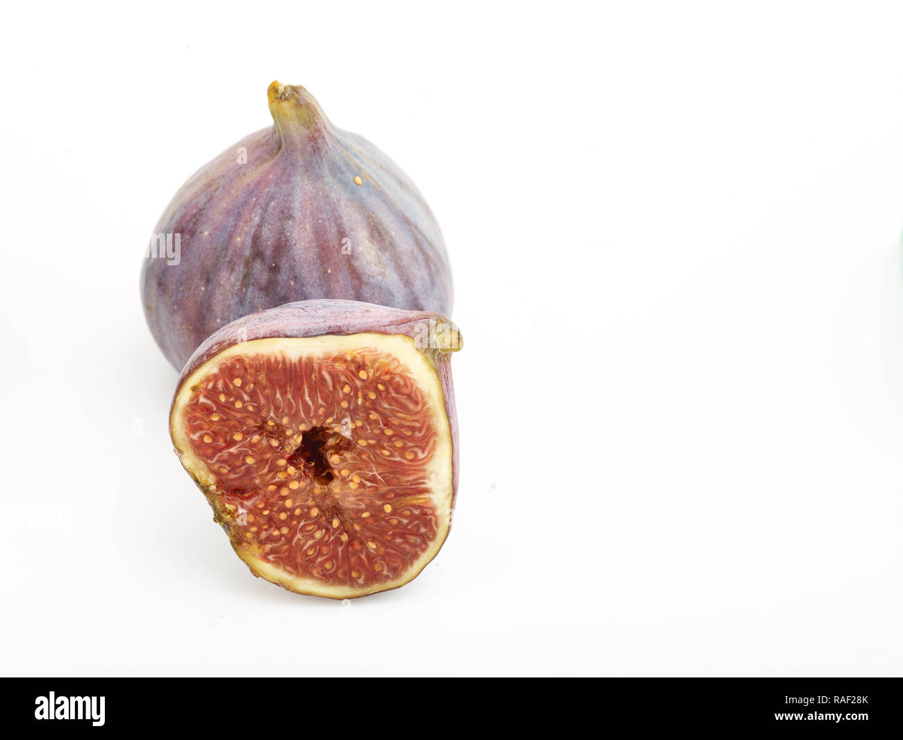 Fig frutto contro uno sfondo bianco, cibo still-life fotografia Foto Stock