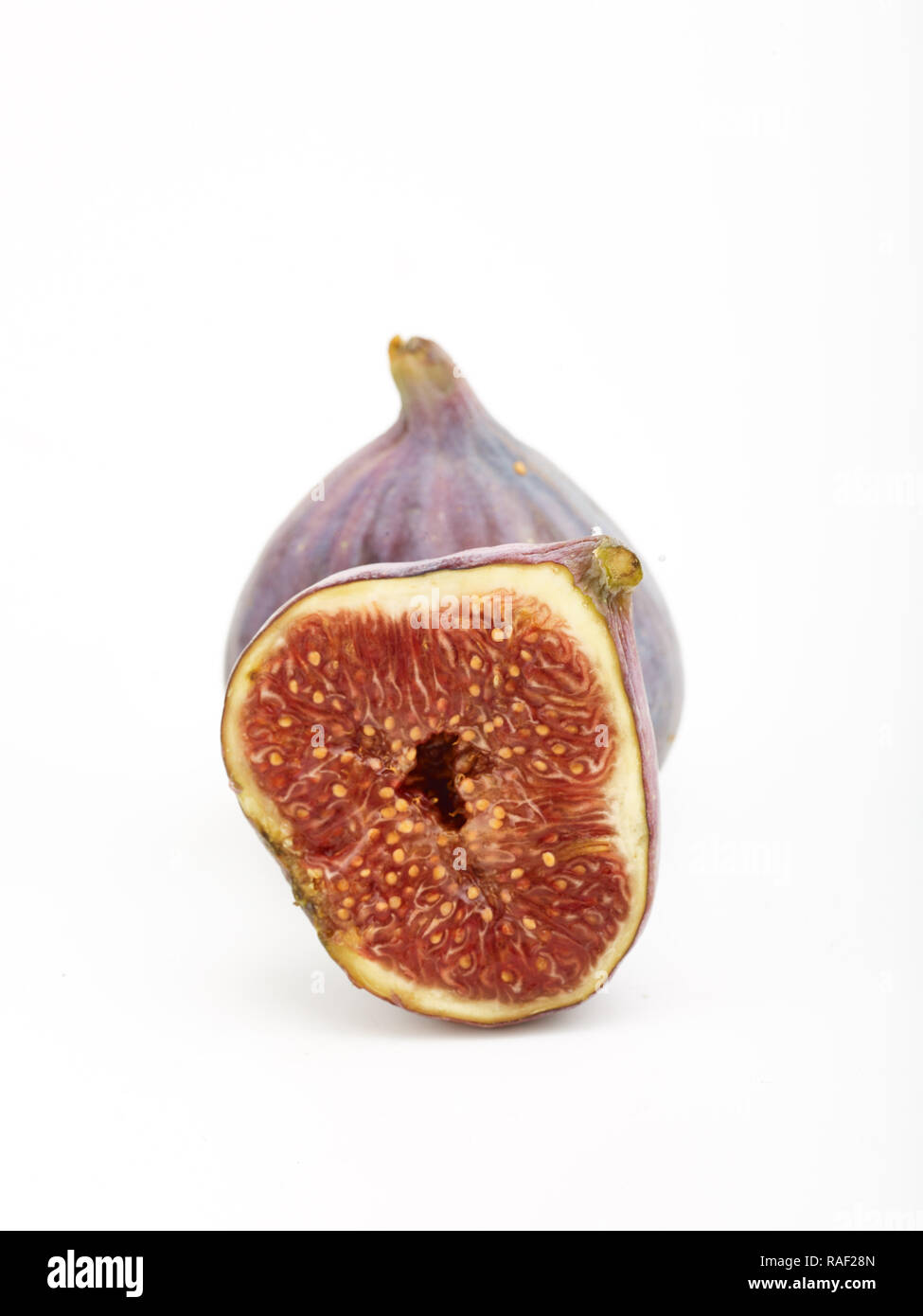 Fig frutto contro uno sfondo bianco, cibo still-life fotografia Foto Stock