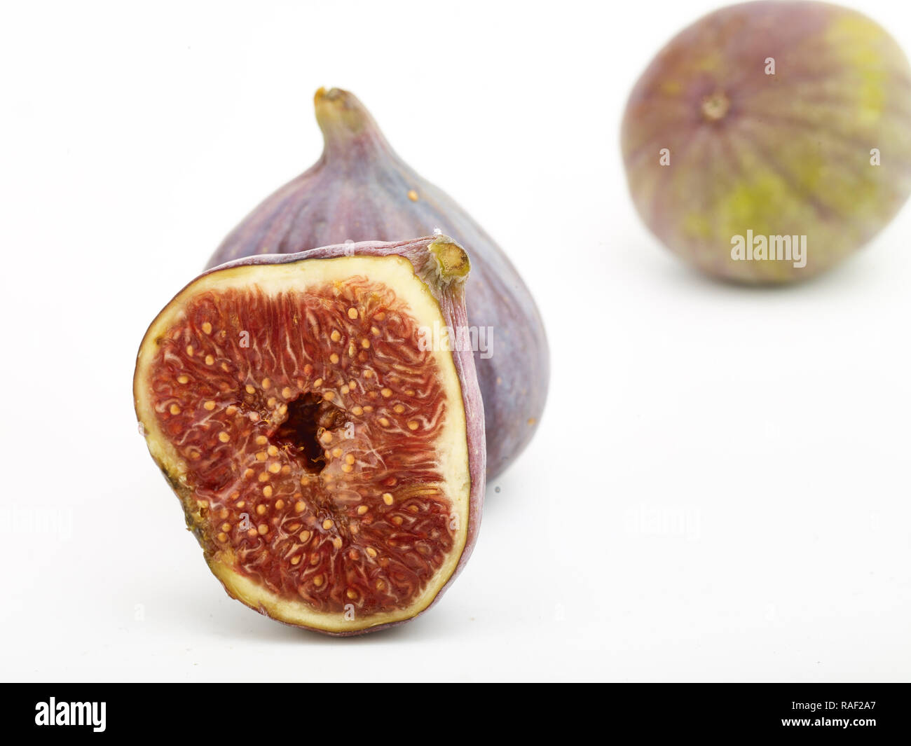 Fig frutto contro uno sfondo bianco, cibo still-life fotografia Foto Stock