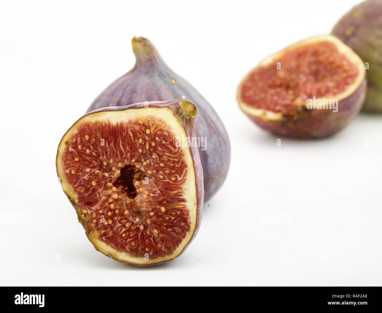 Fig frutto contro uno sfondo bianco, cibo still-life fotografia Foto Stock