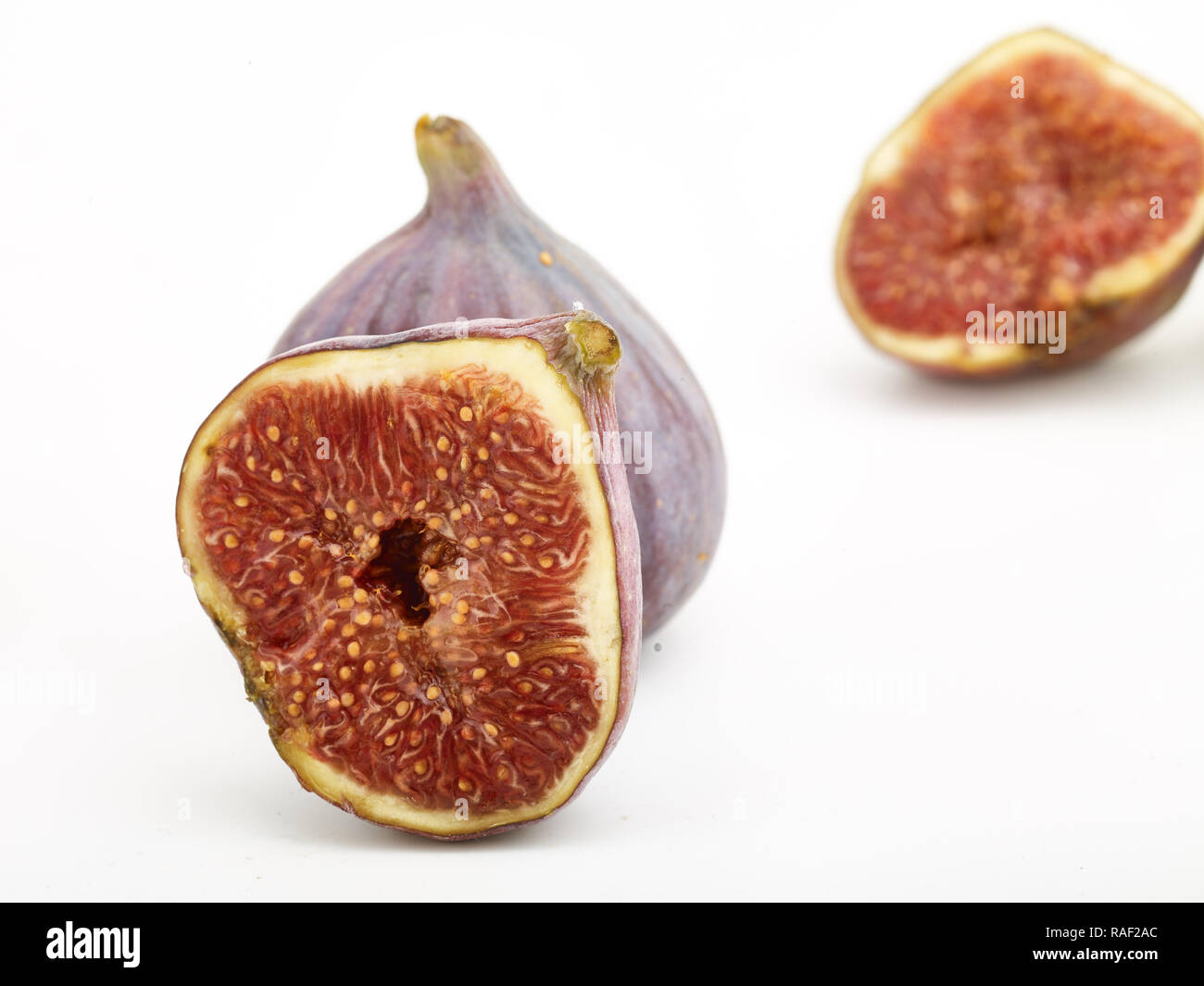 Fig frutto contro uno sfondo bianco, cibo still-life fotografia Foto Stock