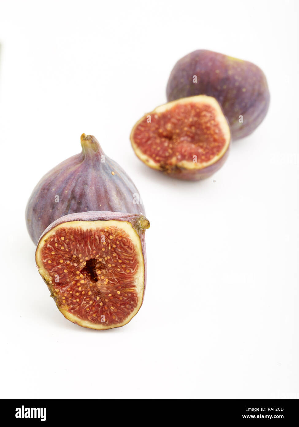 Fig frutto contro uno sfondo bianco, cibo, still-life fotografia Foto Stock