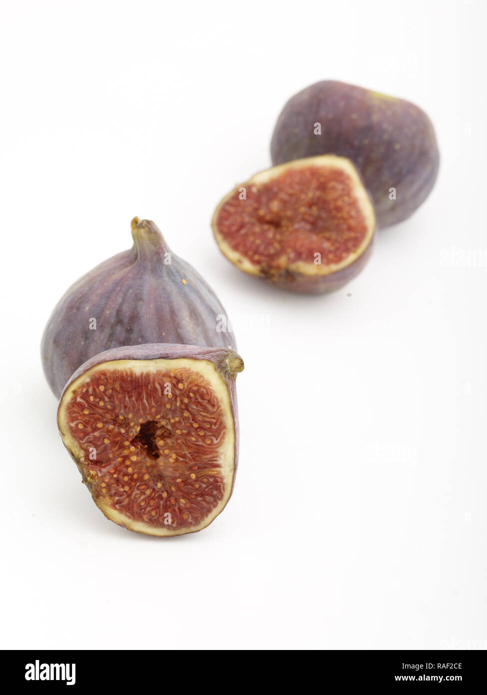Fig frutto contro uno sfondo bianco, cibo, still-life fotografia Foto Stock