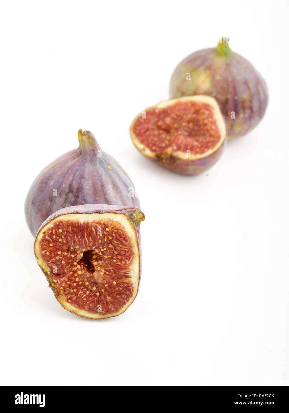 Fig frutto contro uno sfondo bianco, cibo, still-life fotografia Foto Stock