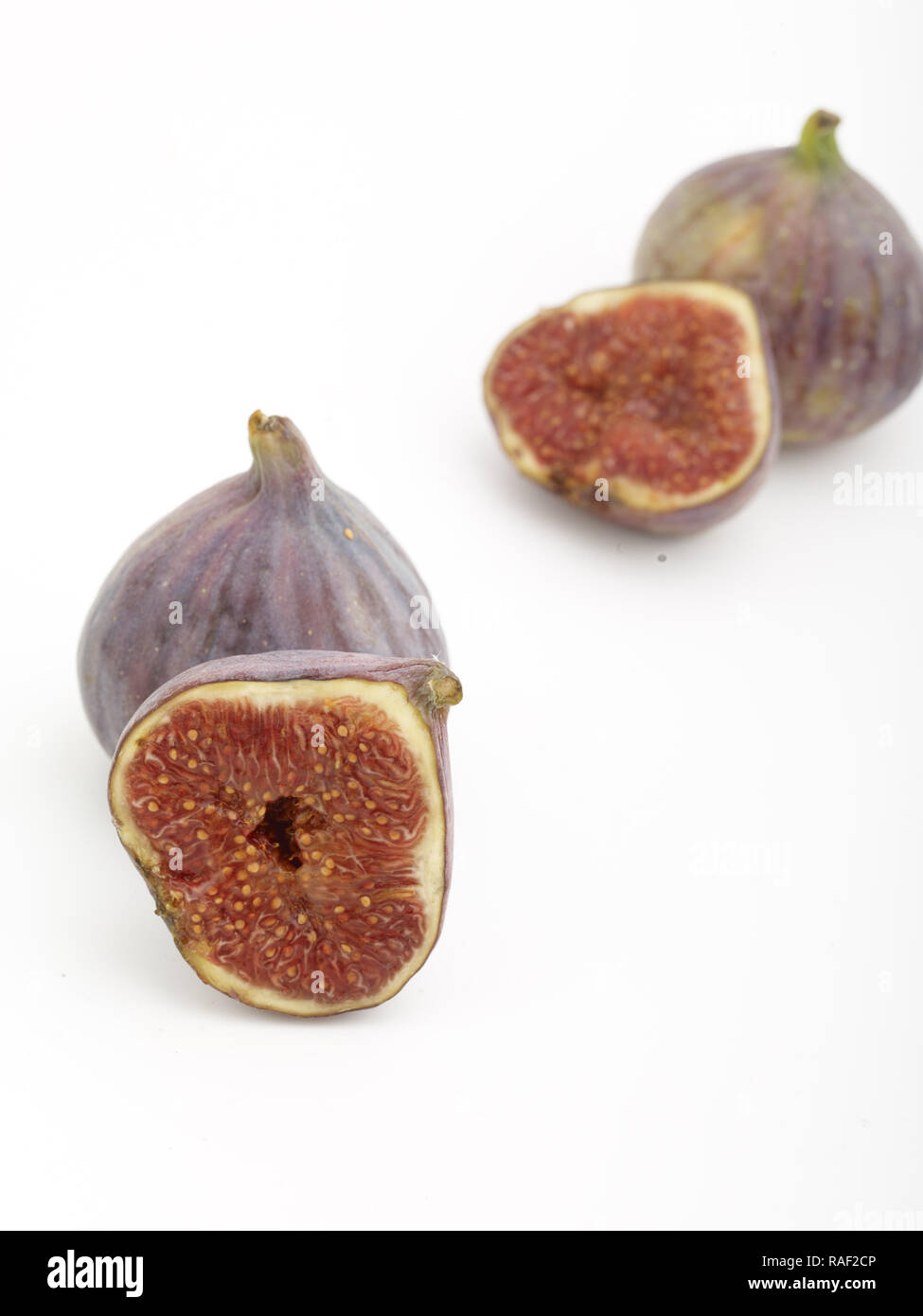 Fig frutto contro uno sfondo bianco, cibo, still-life fotografia Foto Stock