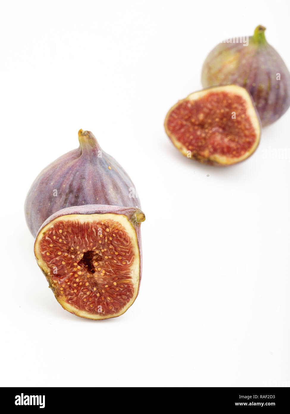 Fig frutto contro uno sfondo bianco, cibo, still-life fotografia Foto Stock
