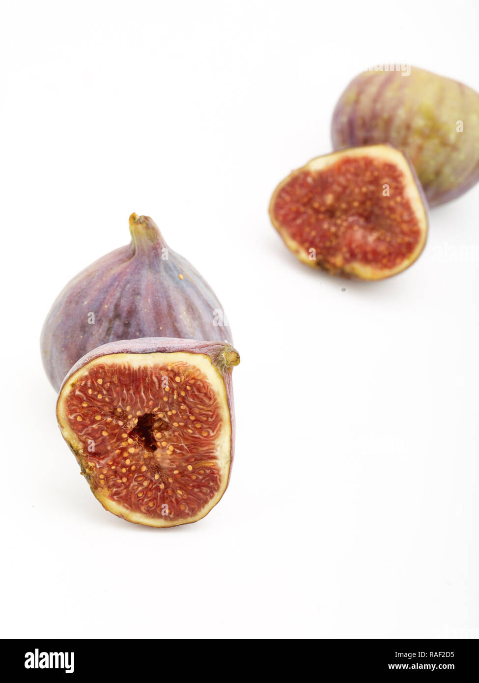 Fig frutto contro uno sfondo bianco, cibo, still-life fotografia Foto Stock