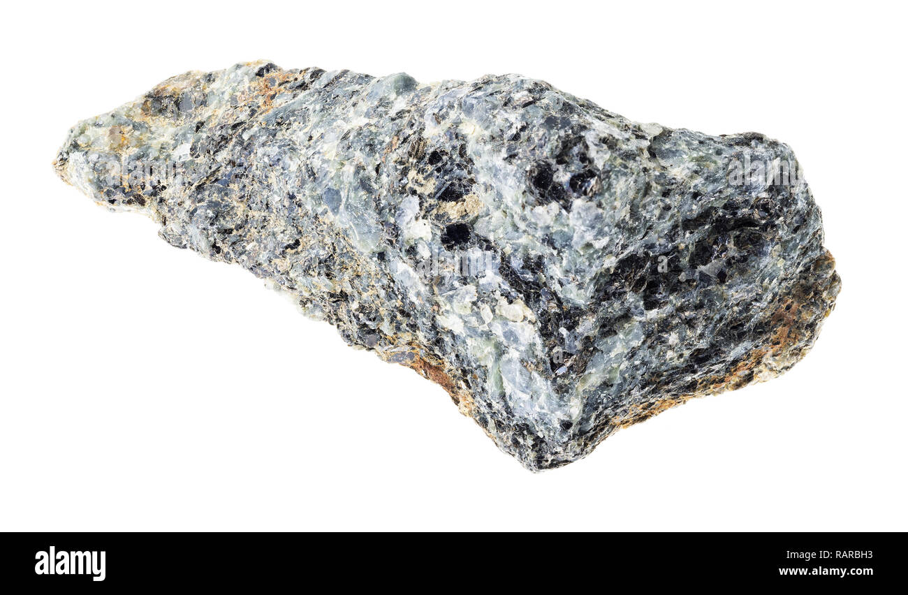 La fotografia macro di naturale minerale da collezione geologica - ruvida biotite nefelina sienite roccia su sfondo bianco Foto Stock