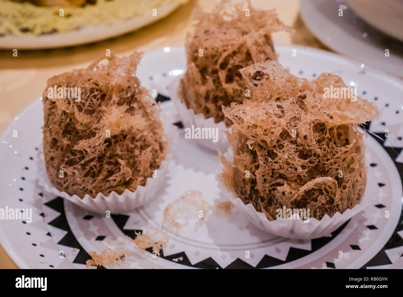 Fritte taro puff dim sum in un ristorante cinese Foto Stock