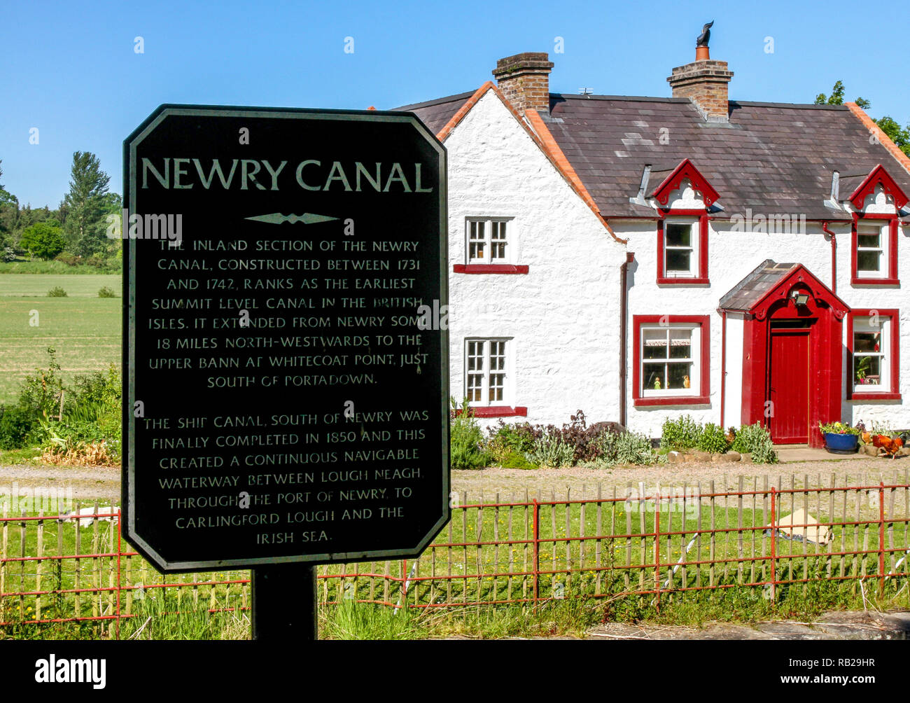 Newry Canal informazioni segno a Moneypenny di blocco vicino a Portadown, nella contea di Armagh. Moneypenny's Lockhouse è un edificio restaurato del blocco di canal house. Foto Stock