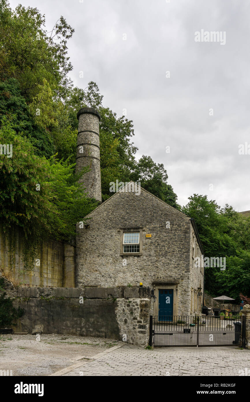 Litton Mill, una ex fabbrica tessile databili dal XVIII secolo, mugnai Dale, Derbyshire, Regno Unito; ora convertiti in appartamenti ad uso residenziale. Foto Stock